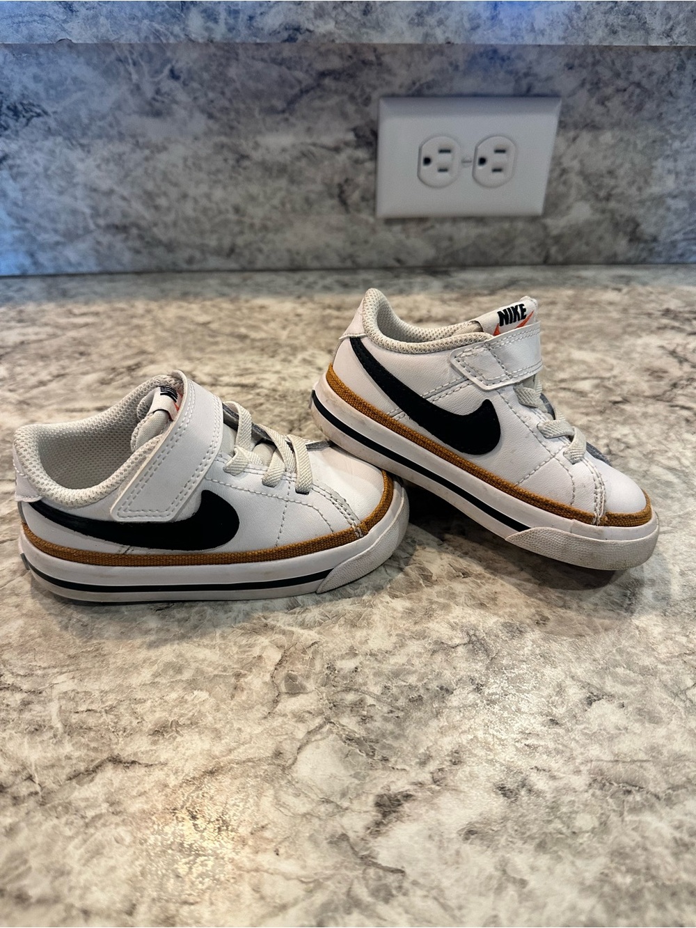 Nike Kids White and Black Low-Top Sneaker with Brown Accent